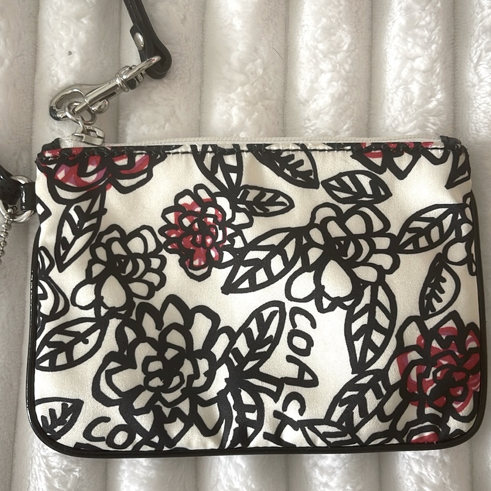 Coach Poppy Floral Wristlet with Black and Red Accents EUC
No Callouts - Picture 10 of 10